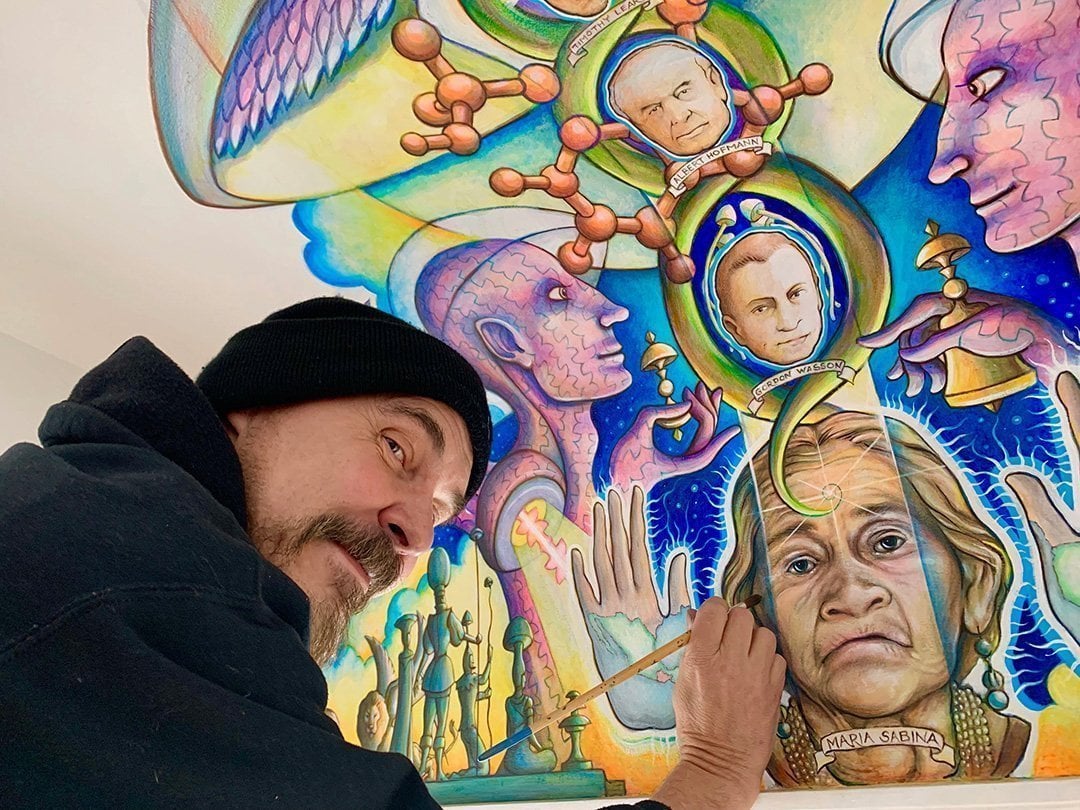 Perry Kroeger painting Mushroom Cafe mural